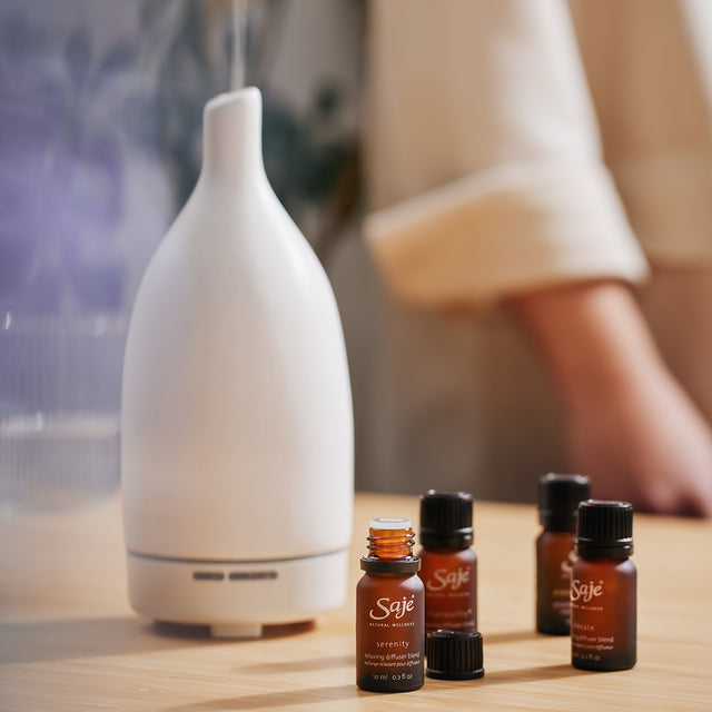 White Aroma Om diffuser with Serenity diffuser blend.